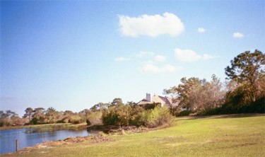 This lakeside home in Prairie Creek Estates enjoys the serenity and peacefulness of nature, yet is just a few minutes from downtown Punta Gorda and Port Charlotte.